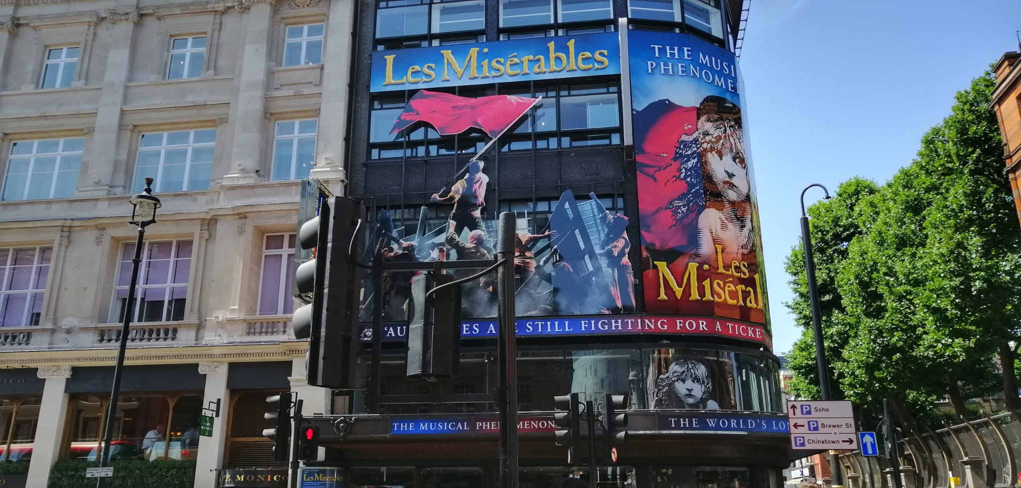 Theater marquee announcing Les Miserables in London