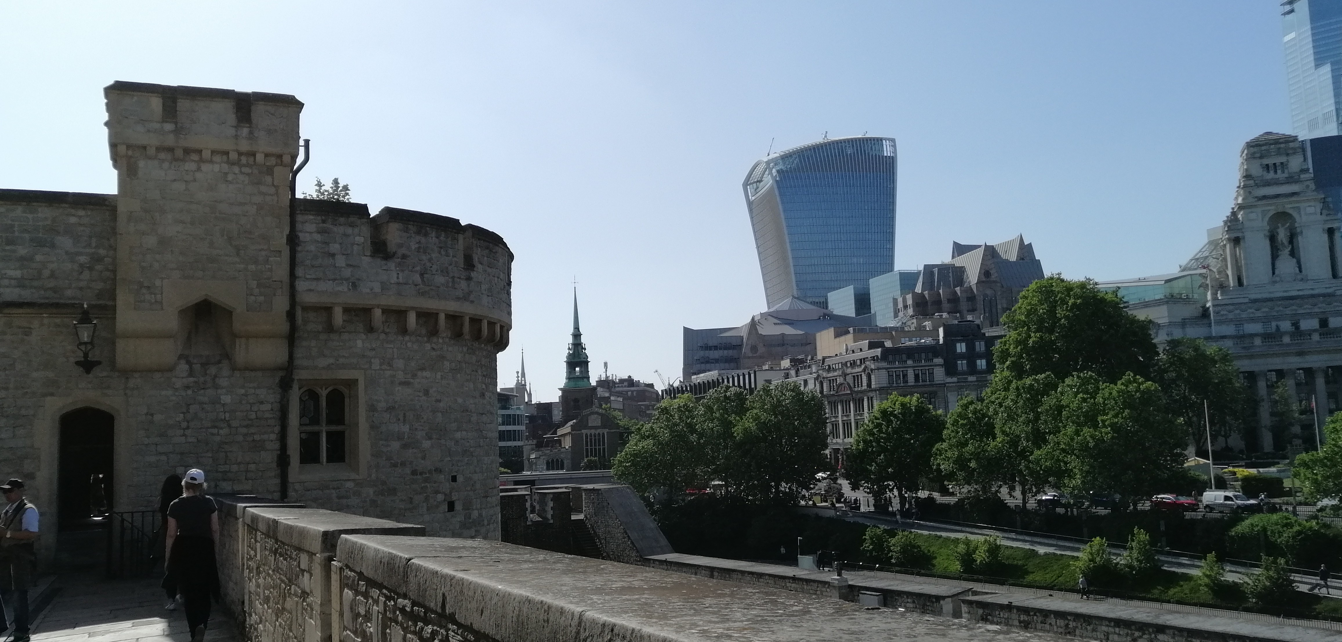 Tower of London with surrounding modern skyscrapers